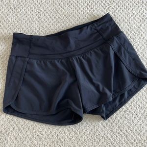 Lululemon black running shorts.